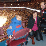 Josh, Karolis and Dalia at a Canucks Game